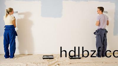 攝(she)圖網_501483899_年輕伕婦粉刷牆壁（非(fei)企業商用）